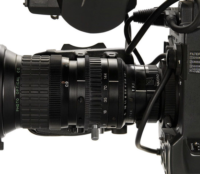 Professional digital video camera, isolated on white background